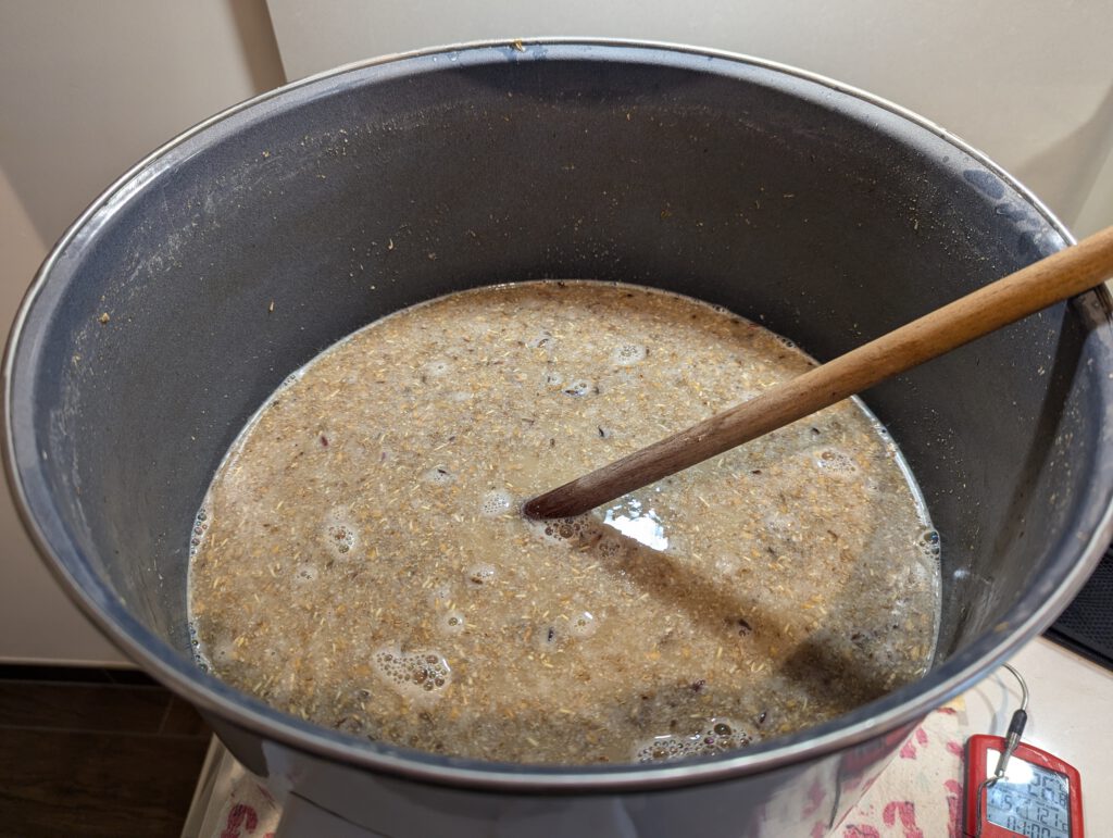 The main mash, visibly paler than the boiling decoction portion.