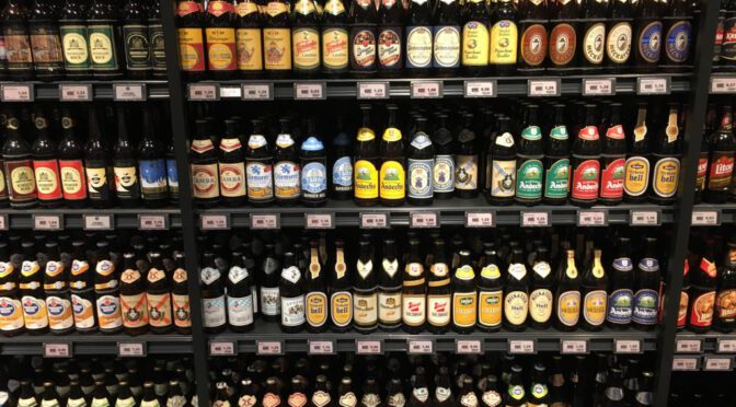 Shelves full of mostly German beers.